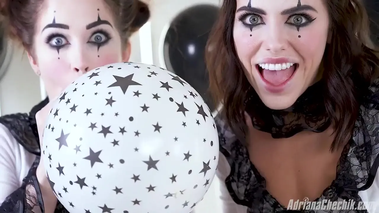 Adrianachechik plays with star balloons in her white clown dress, shameless
