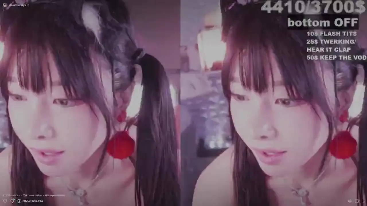 Teasing her tits and tongue-out grin while AsianBunnyx plays the naughty kitty for the chat