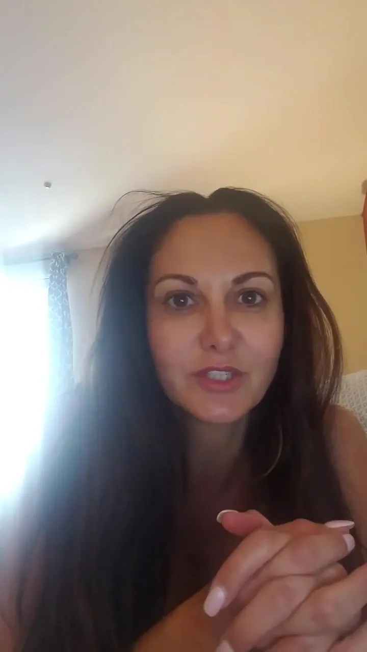 Ava Addams arches her back and lets out a filthy moan as her legs fall open wide