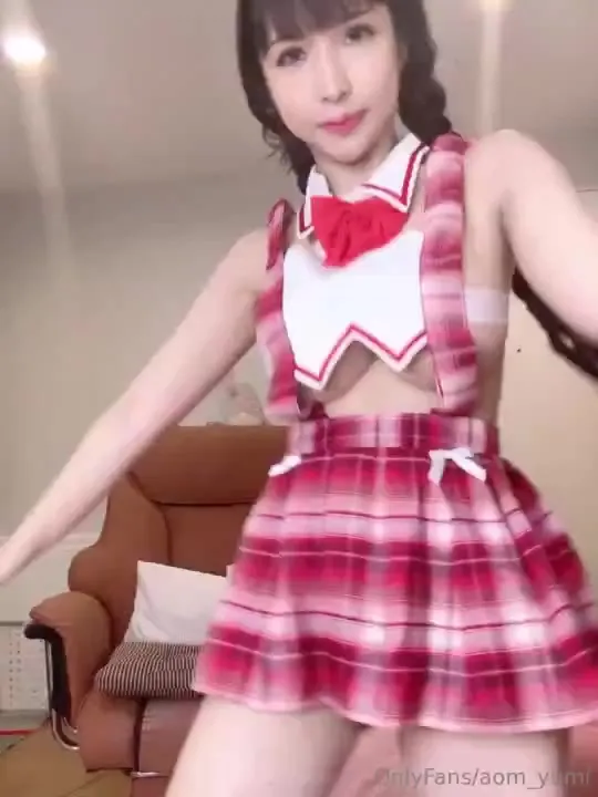 Lifting her plaid skirt to flash her bare ass while playing with pigtails, Avaaddams