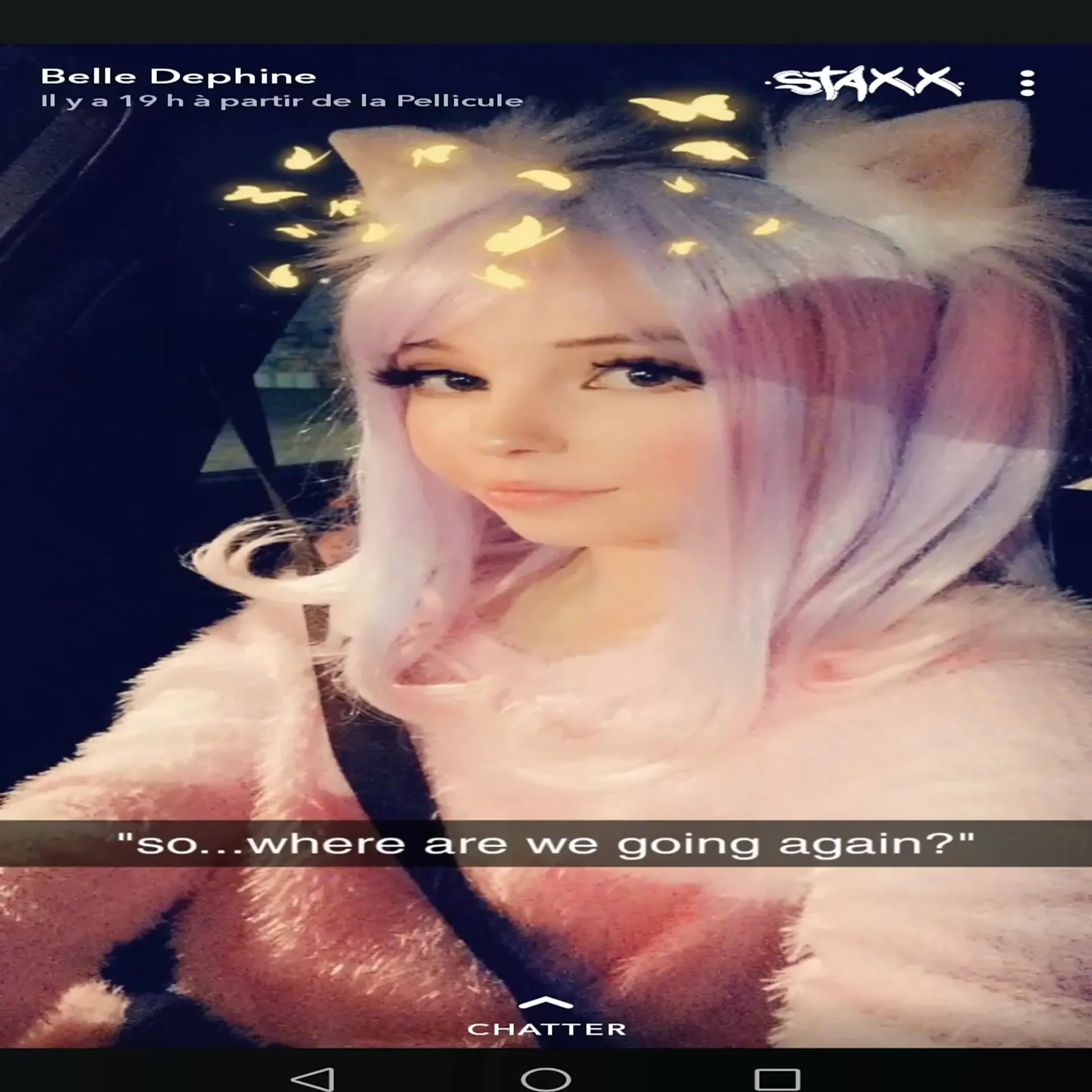 Teasing her clit with a clear toy, Belle Delphine sinks back and lets herself go
