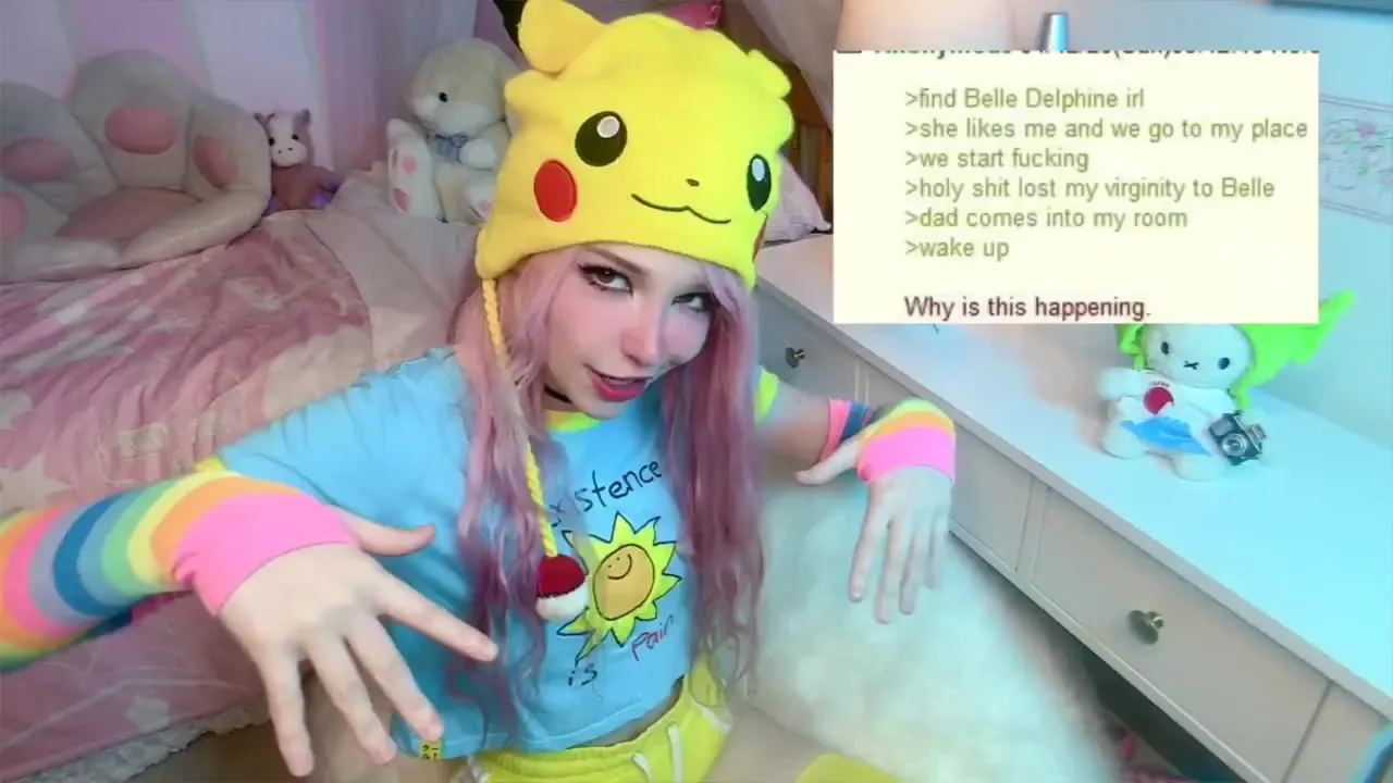 Belledelphine in cat ears and a cutout top, teasing on pink sheets