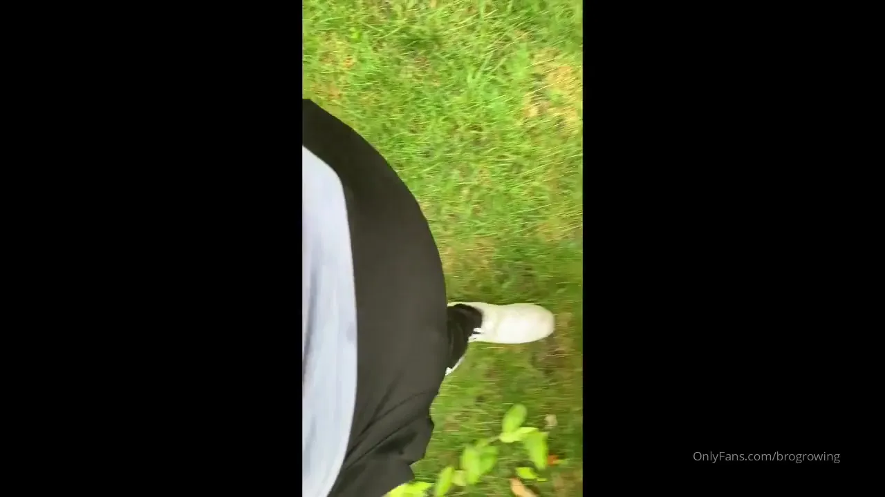 Black Adidas hoodie straining over his gut as GrowingMuscleBro sways, hungry and unhurried