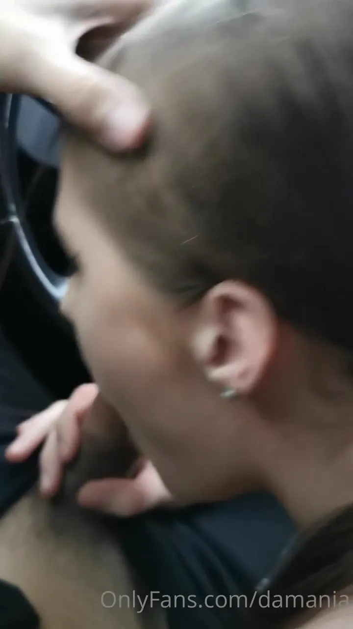 In the passenger seat, Damania deepthroats a veiny cock with her lips sealed tight