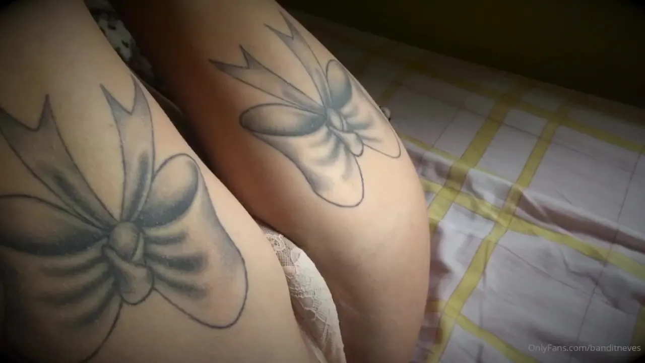 Tatiana Neves grinds her tattooed ass into the striped sheets, wanting more