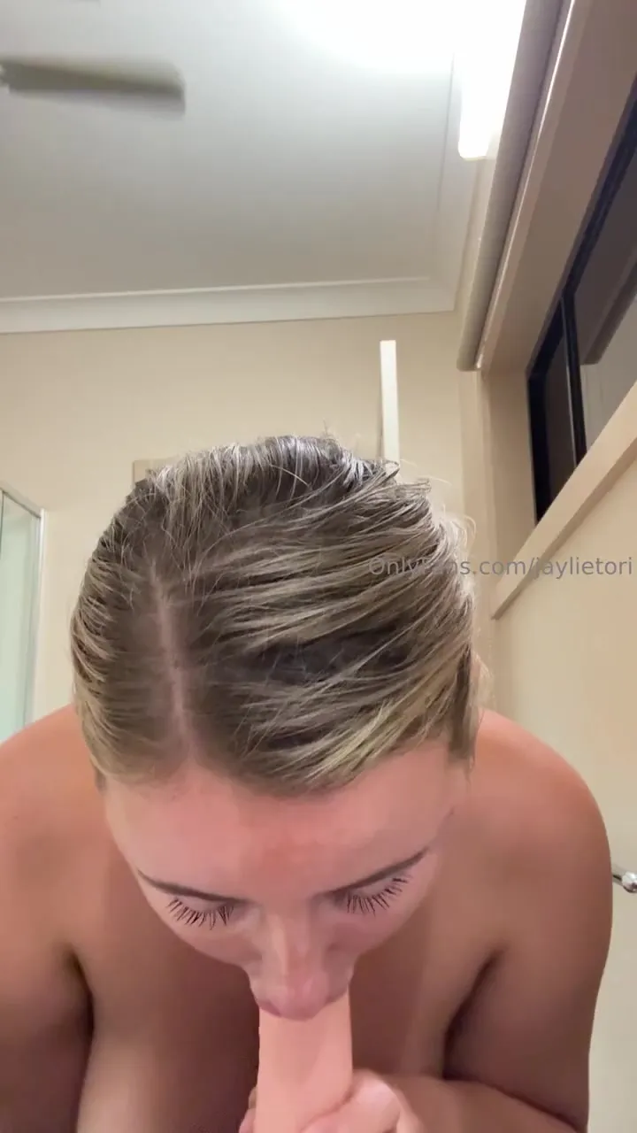 Late night in the hallway, Jaylie Tori gets messy with a pink dildo between her tits