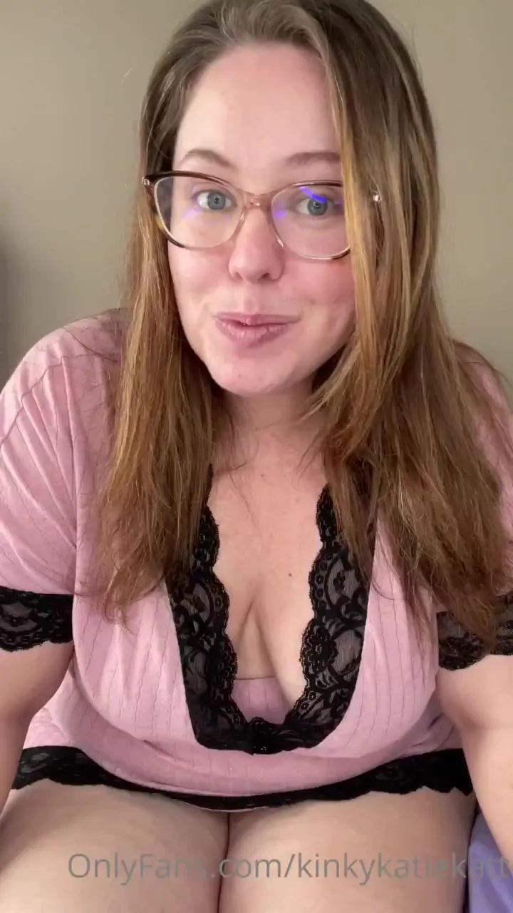 KinkyKatie peels her pink lace top aside and lets her big natural tits spill free