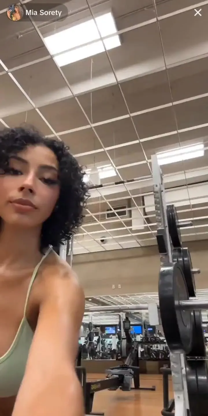 Mia Sorety bends over the kettlebell, tits swinging, panting hard and loving it