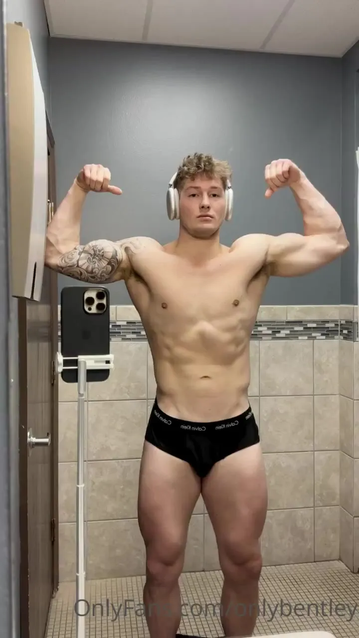 Nate strips down bare and flexes for his own hungry camera, not holding back