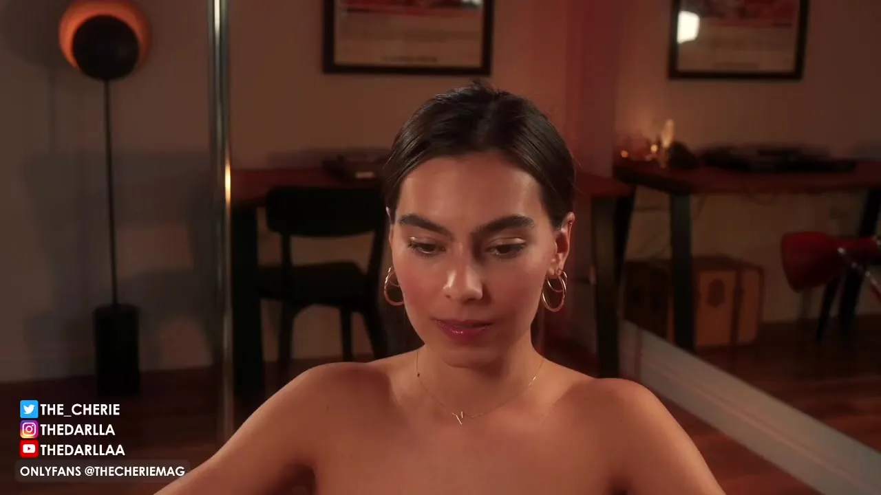 Bending over the mirror, Thecheriemag spreads her ass wide and fucks her own reflection