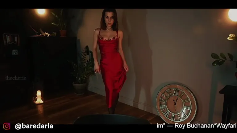 Lifting her arms to tease the neckline, Thecheriemag strips off her slip dress