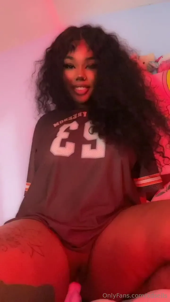 Nye Lt works her pink dildo in and out, tongue out and hips bucking
