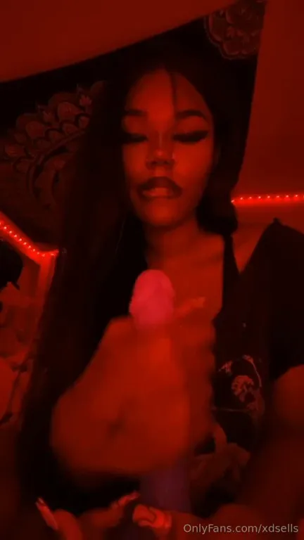 Nye Lt wraps her lips around a purple dildo and gags on it