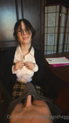 In a white shirt and plaid skirt, Big Titty Goth Egg bounces on a thick toy and growls
