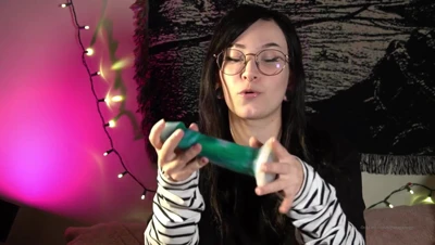 Big Titty Goth Egg moans with her mouth open and eyes wide as she rides the toys