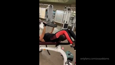 Sunrise sweat as Ava Addams hammers the gym machines in tight black and red leggings