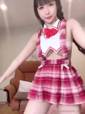 Lifting her plaid skirt to flash her bare ass while playing with pigtails, Avaaddams