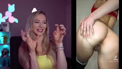 Bebahan flashes her tits and laughs at the clips on her screen