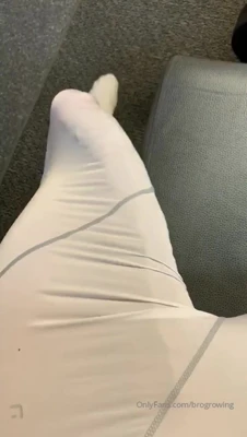 Gym floor in white leggings, GrowingMuscleBro grips his stiff cock and grinds it hard through the stretch, fully committed