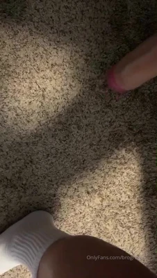 Stroking his thick uncut cock while GrowingMuscleBro grins down at the beige carpet