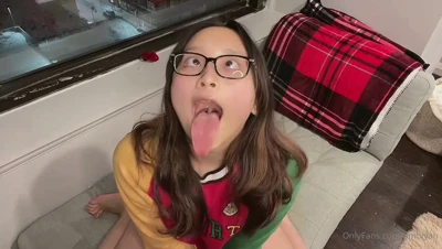 Mae opens wide by the window and sticks her tongue out for you
