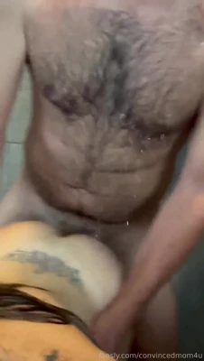 Kneeling on soaked tile, Lana laughs and lets his cock slide between her ass cheeks