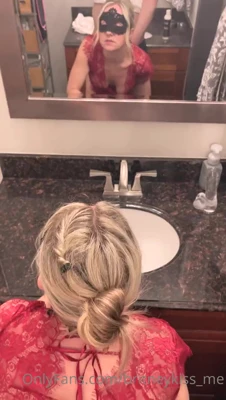 Britney bends over the bathroom sink, moaning as he fucks her from behind in her red lace