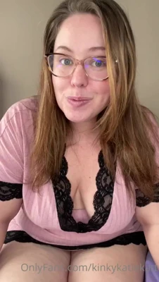 KinkyKatie peels her pink lace top aside and lets her big natural tits spill free