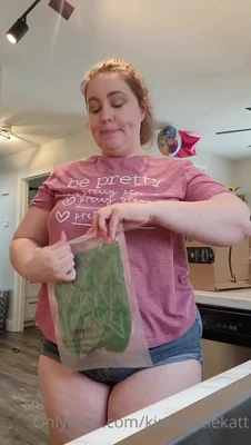 Kitchen counter, a torn package and a filthy little "i heart Daddy" bodysuit