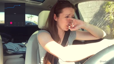 Nadia Foxx stays buckled in the driver's seat, chatting dirty with the door swung wide