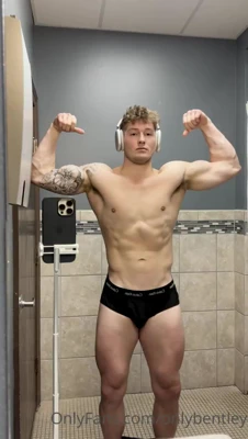 Nate strips down bare and flexes for his own hungry camera, not holding back