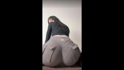 Gray cargo pants down, Nora Fawn bares a red striped thong and begs to be ruined
