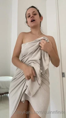Quinnfinite drops her towel in the bathroom, flashing her big tits and bush, and she can't get enough of being seen