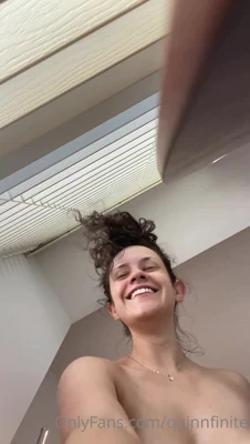 Soapy and bare in the shower, Quinnfinite strokes her tits and rubs her pussy