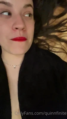 Baring her big natural tits for Quinn Finite, flat on the wood floor and aching to be seen