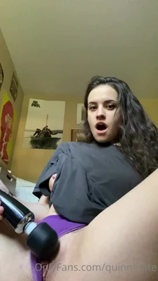 Riding a black double-ended toy on her back, Quinnfinite moans like a needy whore