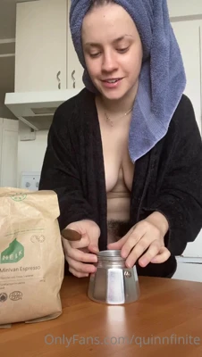 Early morning in the kitchen, Quinn Finite flashes her huge natural tits while the coffee brews