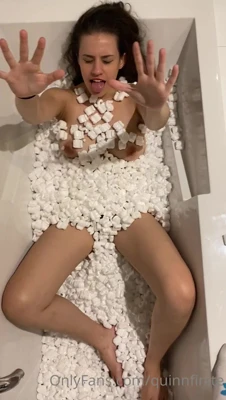 Quinnfinite coats her tits in marshmallow goo, sticky and smug in the tub