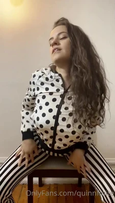 Peeling off her jacket and bending over the chair, Quinn Finite flashes her big natural tits and bares her ass
