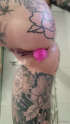 Muddy works the pink plug in and gasps as it sinks deeper