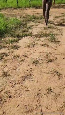 Muddy trail mess: Muddy hauls brush in her black thong, dirt on every inch