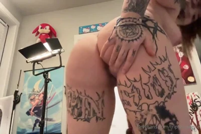 Triplexceleste rides that thick toy with a grin, her tattooed ass flexing hard