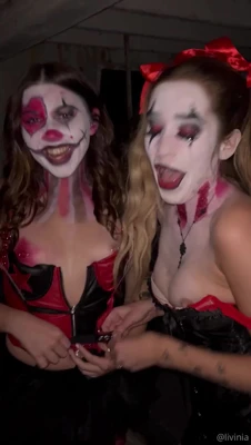 Clown girls smear each other with paint, moaning like filthy little whores