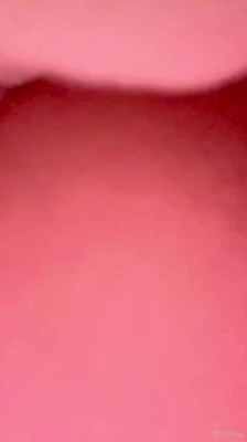 Red-lit solo, Livinia Roberts grinds a dildo deep and shakes through the climax