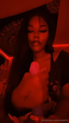 Nye Lt wraps her lips around a purple dildo and gags on it