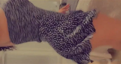 Steamy bathroom, Britt yanks her polka-dot dress down and flashes her tits